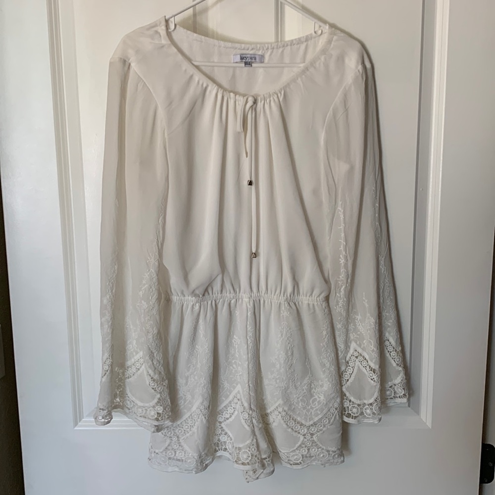 Lucy Paris white lace romper size M. Worn once - like new condition.